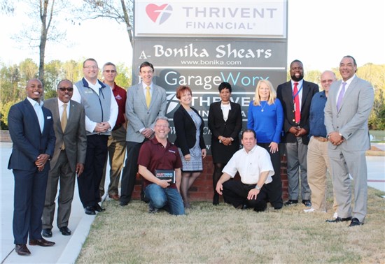 Standing from left: Lawrence Williams, owner, Gravity Indoor Trampoline Park; Melvin Everson, director of Business and Industry Training, Continuing Education, Gwinnett Technical College; Jeff Tweed, owner, Big Frog Custom T-Shirts and More of Snellville; Eric Van Otteren Snellville Economic Development Manager; Councilman Dave Emanuel; Barbara McClure, founder and chief executive officer of Snellville-based A Defined Image Med Spa; Karen Foote, owner, L.E.A.A.D.S; Debra Poirot, District director, Congressman Rob Woodall's office; Christopher Blocker, business services specialist, WorkSource Atlanta Regional Commission; Doug Adams, president Greater Eastside Chamber of Commerce and Adams Financial Management owner; and Bruce LeVell, Small Business Association's Office of Advocacy's Region 4 advocate.  Kneeling from left: Edward MacFarlane, owner FastSigns, and Joe Wilson, political activist.